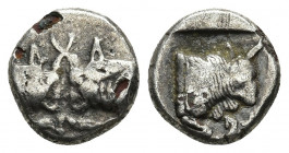 CARIA. Uncertain. Diobol (Circa 480-450 BC). 1.71gr. 11.7mm.
Obv: Confronted foreparts of two bulls, with horns locked. Rev: Forepart of bull left; a...