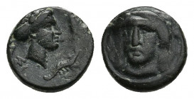 CARIA. Iasos. Ae (4th-3rd centuries BC). 0.99gr. 9.1mm.
Laureate head of Apollo facing slightly left. Rev: IAΣI. Head of nymph right, with hair in sa...