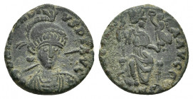 ARCADIUS (383-408) 2.48g 16.1mm Follis. Kyzikos.
Obv: D N ARCADIVS P F AVG.
Diademed, helmeted and cuirassed bust facing slightly right, holding spe...