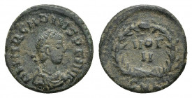 Arcadius AD 383-408 1.03g 13.9mm Cyzicus
Follis Æ
D N ARCADIVS P F AVG, pearl-diademed, draped, and cuirassed bust right / VOT V within wreath; mint...