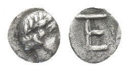 Greek
IONIA, Kolophon. Circa 450-410 BC. AR Tetartemorion
Laureate head of Apollo right / TE monogram (mark of value) within incuse square. 0.2g 5.2...