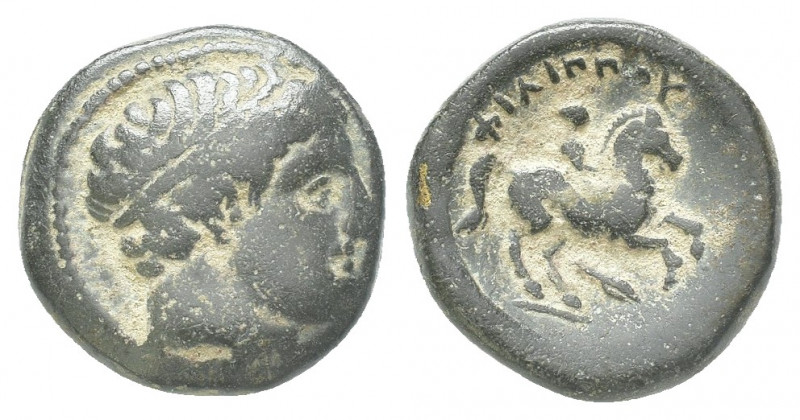 Greek
Macedonia, Philip II. AE 16-18; Macedonia, Philip II; AE Obv: Head of Apo...
