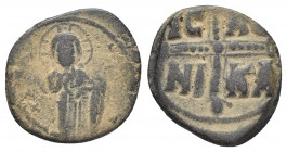 Byzantine
Michael IV The Paphlagonian, 1034 - 1041 AD
AE Follis, Constantinople Mint, 
Reverse: Large jeweled cross with pellet at each extremity, IC ...