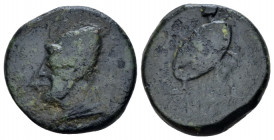 Umbria, Ariminum Bronze circa 268-225, Æ 17.00 mm., 6.17 g.
Bust of Vulcan l., wearing pileus. Rev. ARIMN Warrior advancing l., holding spear and shi...