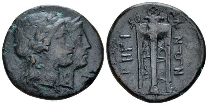 Bruttium, Rhegium Triens circa 215-150, Æ 27.00 mm., 9.25 g.
Jugate heads of Ap...