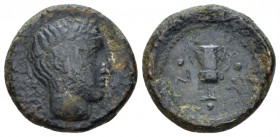 Sicily, Naxos Trias circa 410-403, Æ 15.00 mm., 3.80 g.
Wreathed young male head r. Rev. Cantharus three pellets around. Campana 36. Calciati1. SNG A...