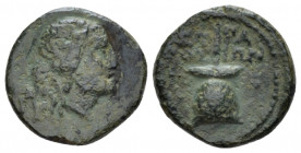 Sicily, Syracuse Bronze after 212, Æ 11.00 mm., 2.46 g.
Head of Apollo l. Rev. Apex. Calciati 215. SNG ANS –.

Very fine