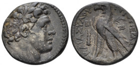 Phoenicia, Tyre Half shekel 115-114, AR 20.00 mm., 6.89 g.
 Laureate head of Melkart r. Rev. Eagle standing l. on prow, palm behind; BI (date) above ...