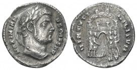 Galerius caesar, 293-305 Argenteus Nicomedia 295, AR 17.00 mm., 2.81 g.
Laureate head r. Rev. Four tetrarchs sacrificing over tripod before city encl...