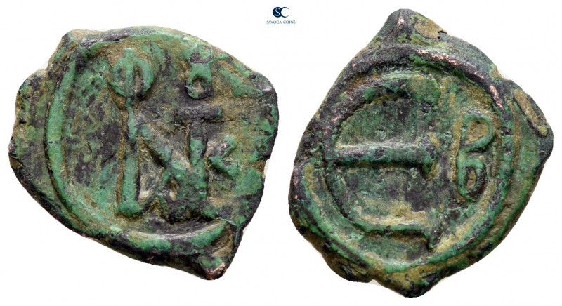 Justin II AD 565-578. Constantinople
Pentanummium Æ

15 mm, 1,80 g



ver...