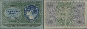 Austria: 100.000 Kronen 1922 P. 81, used with strong vertical and horizontal fold, center hole, minor border tears (one of them 0,5cm taped) but still...