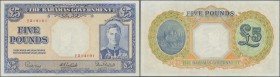 Bahamas: 5 Pounds L.1936 with signature title at left: Commissioner of Currency, P.12b, very nice condition with a few soft folds, tiny spots at cente...
