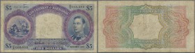 Barbados: 5 Dollars December 1st 1939, P.4a, almost well worn condition with stained paper, several folds., tiny border tears and small holes at cente...