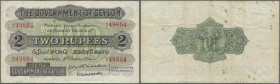 Ceylon: 2 Rupees October 1st 1925, P.21astill crisp paper with several folds and tiny rusty spots. Condition: F+