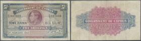 Cyprus: 5 Shillings February 1st 1952, P.29, lightly toned paper with several folds, small tear at lower margin. Condition: F