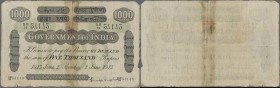 India: 1000 Rupees BOMBAY June 2nd 1913, P.A19, extraordinary rare note with taped tears and stains. Condition: F