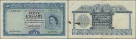 Malaya & British Borneo: 50 Dollars 1953, P.4a, lightly toned paper with several folds and black stains on back. Condition: F+