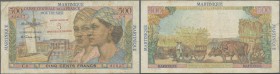 Martinique: 5 NF on 500 Francs ND P. 38, seldom see note in used condition with folds and creases, light stain in paper, a few usual pinholes but no t...