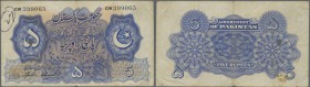 Pakistan: 5 Rupes ND P. 5, used with folds and pen writing at upper left, larger hole from pin hole at left, no repairs, condition: F.