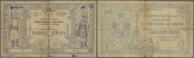 Serbia: 50 Dinara 1914, P.13, well worn condition, torn in two halfs, several tears along the borders, stains and graffiti at upper center on front, b...