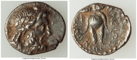 CARIA. Myndus. Ca. 2nd-1st centuries BC. AR drachm (18mm, 4.11 gm, 1h). Choice VF. Uncertain magistrate. Laureate head of Zeus right / MYNΔIΩN, headdr...