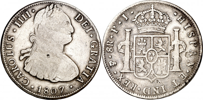 1807. Carlos IV. Potosí. PJ. 8 reales. (AC. 1013). Pequeños resellos orientales....