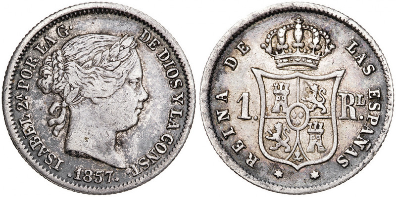 1857. Isabel II. Madrid. 1 real. (AC. 306). Hojita en reverso. 1,33 g. MBC/MBC+.