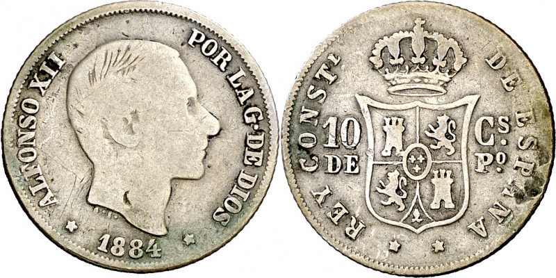 1884. Alfonso XII. Manila. 10 centavos. (AC. 100). Hojitas en reverso. Escasa. 2...