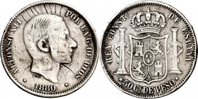1880. Alfonso XII. Manila. 50 centavos. (AC. 112). Rayas. Rara. 12,60 g. (BC).