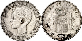 1897. Alfonso XIII. Manila. SGV. 1 peso. (AC. 122). Manchitas. Escasa. 24,78 g. MBC.
