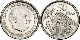 1957*58. Franco. 50 pesetas. (AC. 133). "UNA-LIBRE-GRANDE" en canto. Rara. 12,49 g. EBC-.