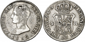 1812/10. José Napoleón. Sevilla. LA. 4 reales. (AC. 23). Impurezas. Escasa. 5,69 g. MBC-/MBC.