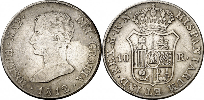 1812. José Napoleón. Madrid. RN. 10 reales. (AC. 29). Dos mundos entre las colum...