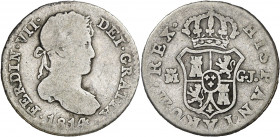 1814. Fernando VII. Madrid. GJ. 1/2 real. (AC. 368). Primer año de busto laureado. Escasa. 1,33 g. BC.