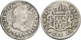 1815. Fernando VII. México. JJ. 1/2 real. (AC. 403). Primer año de busto laureado. 1,58 g. BC.