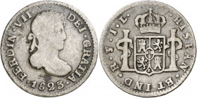 1823. Fernando VII. Potosí. JL. 1/2 real. (AC. 439). Rayitas. Ex Colección de 1/2 real, Áureo 17/12/2002, nº 1735. Escasa. 1,56 g. BC+/MBC-.