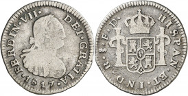 1817. Fernando VII. Santiago. FD. 1/2 real. (AC. 464). Acuñación republicana. Único año de este ensayador Rayitas. Muy rara. 1,35 g. BC/BC+.