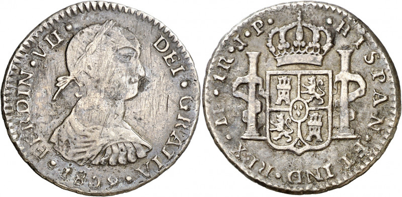 1809. Fernando VII. Lima. JP. 1 real. (AC. 565). Busto indígena. Rayas por limpi...