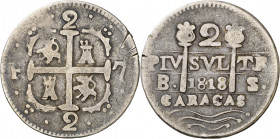1818. Fernando VII. Caracas. BS. 2 reales. (AC. 729). Leones y castillos. Hendiduras en canto. Pátina. Escasa. 4,96 g. MBC-.