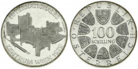 Austria 100 Schilling 1979. Obverse: Value within circle of shields. Reverse: Vienna International center; date bottom right. Edge Description: Letter...