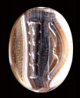 A rare greek banded agate scaraboid engraved seal. Club and bow.