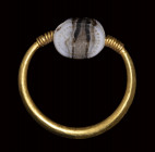 An etruscan banded agate scarab engraved seal set in a gold swivel ring. Sea-horse.