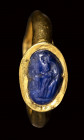 A rare late hellenistic sapphire intaglio set in a gold ring. Venus at the fountain.