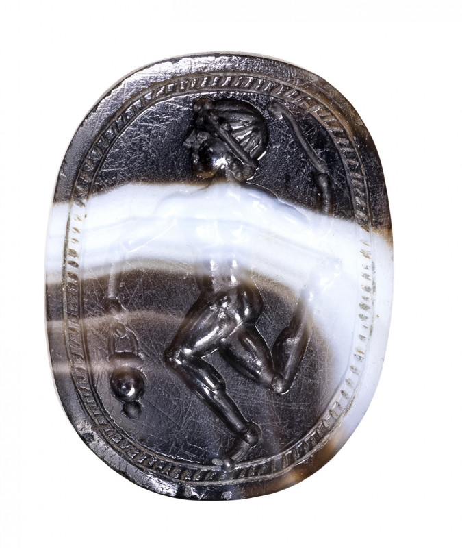 An italic banded agate engraved scarab. Athlete. 

3rd - 2nd century B.C.

1...