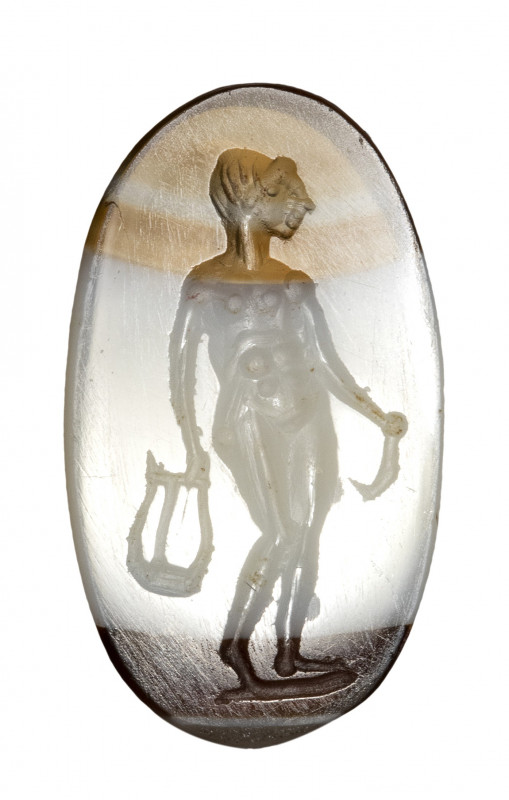A large roman italic banded agate intaglio. Male figure with attributes.

2nd ...