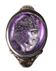 An exceptional greek hellenistic amethyst intaglio set in a late 19th century gold ring. Head of a Youth.