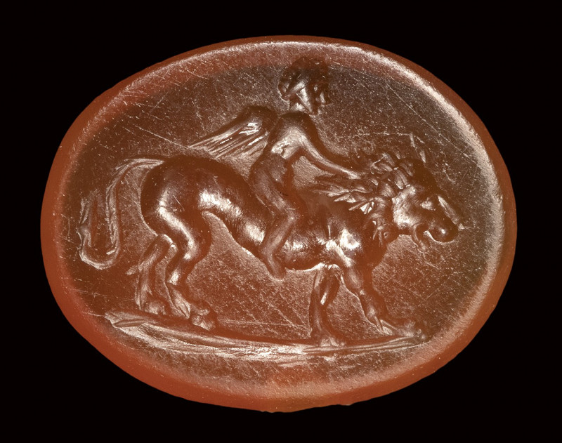 A roman carnelian intaglio. Eros on a lion.

1st - 2nd century A.D.

12 x 15...