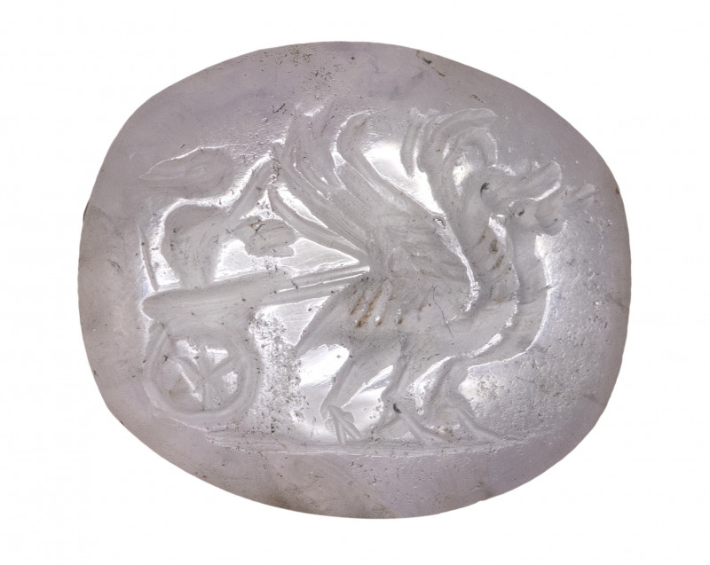 A roman rock crystal intaglio. A mouse riding a chariot with swans. 

2nd cent...