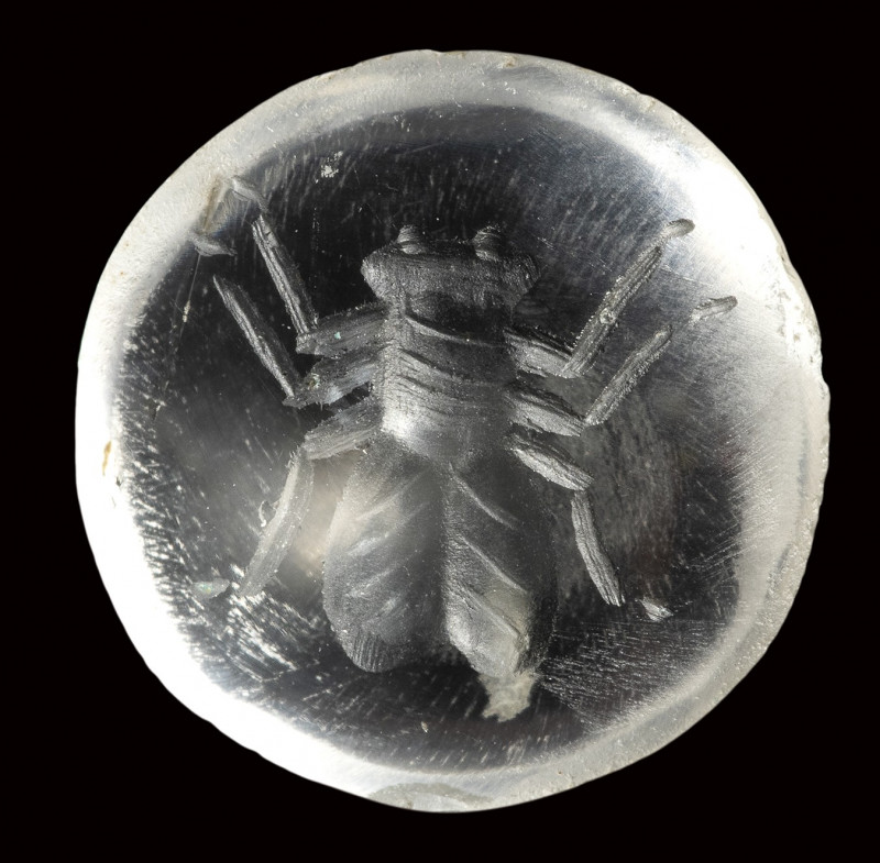 A roman rock crystal intaglio. Fly. 

1st - 2nd century A.D.

Diam. 12 x 4 m...