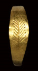 A roman gold ring engraved with palm branch.